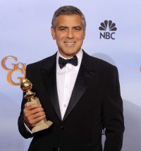 George Clooney ze Złotym Globem za rolę w „Spadkobiercach”  (fot. PAP/EPA/PAUL BUCK)