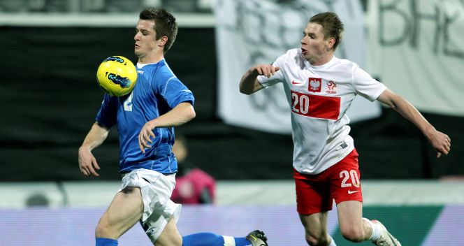 Tomasz Kupisz (P) w pojedynku biegowym z Benjaminem Coliciem (fot. PAP/Radek Pietruszka)